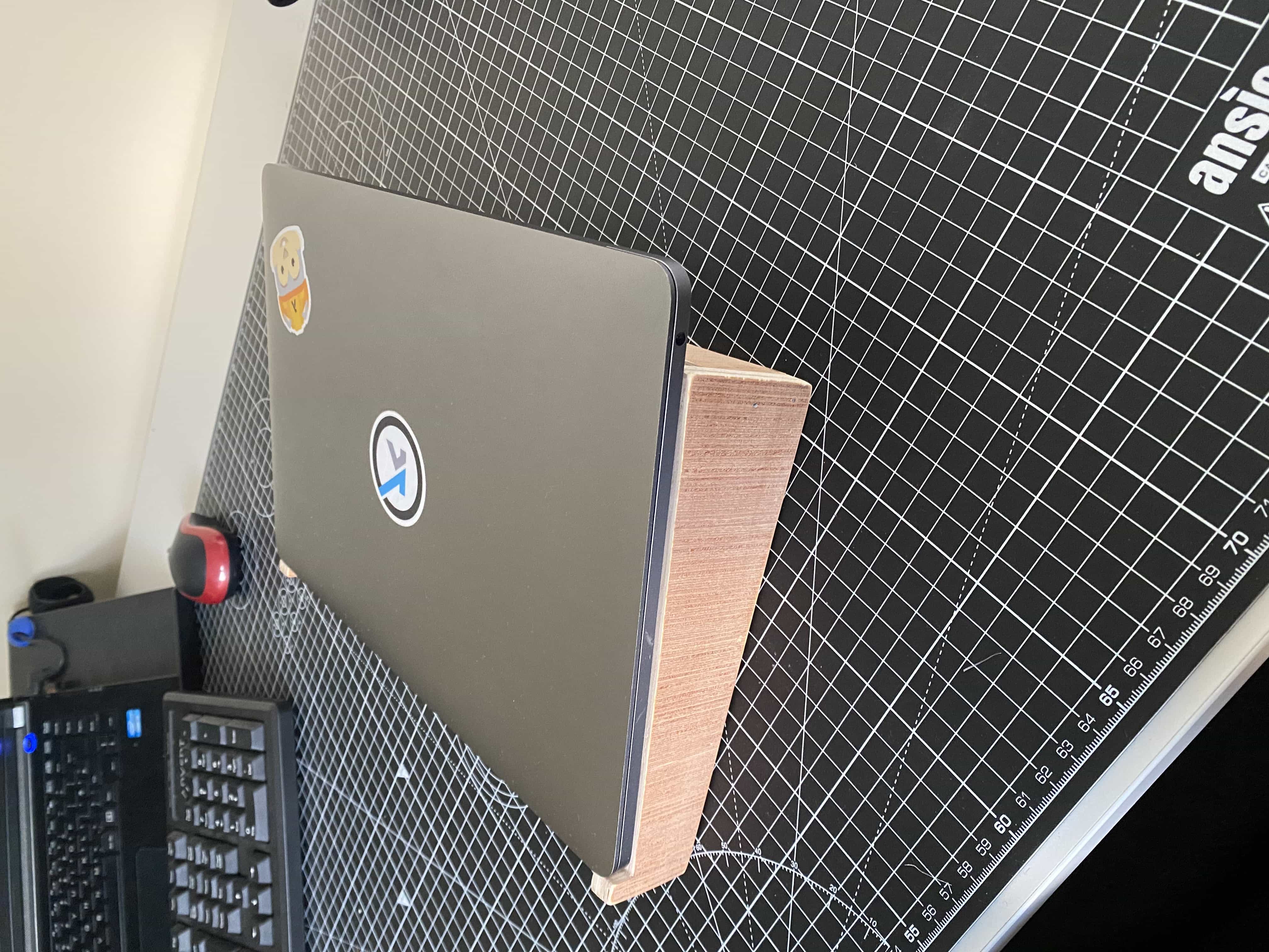 Laptop stand showing floating back.